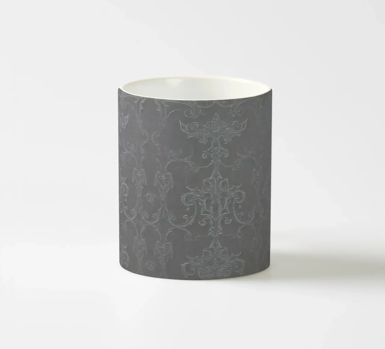 Elegant textured wallpaper with intricate pattern and subtle ceramic mug by DesignDoodle