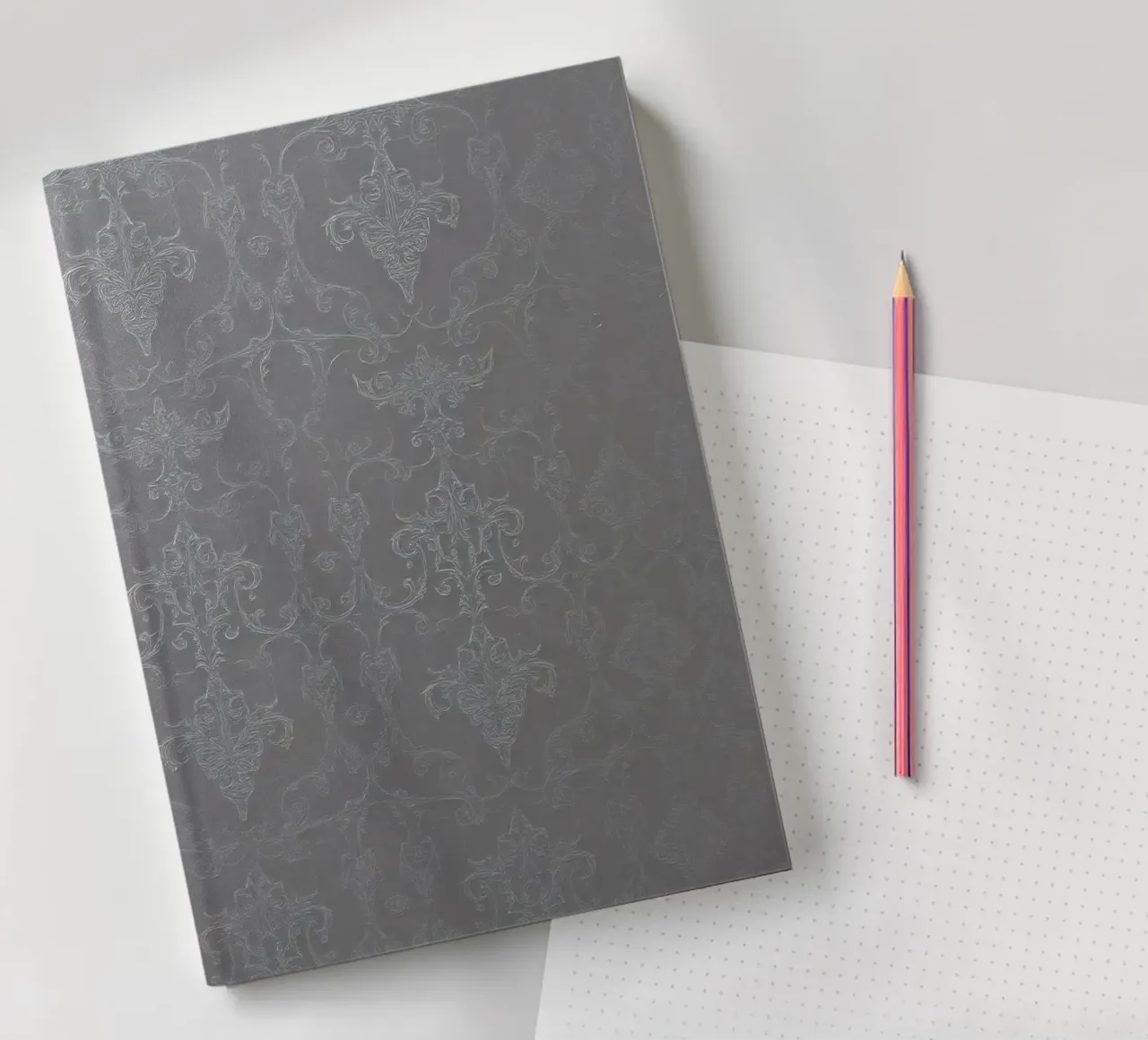 Elegant textured wallpaper with intricate pattern and subtle notebook by DesignDoodle