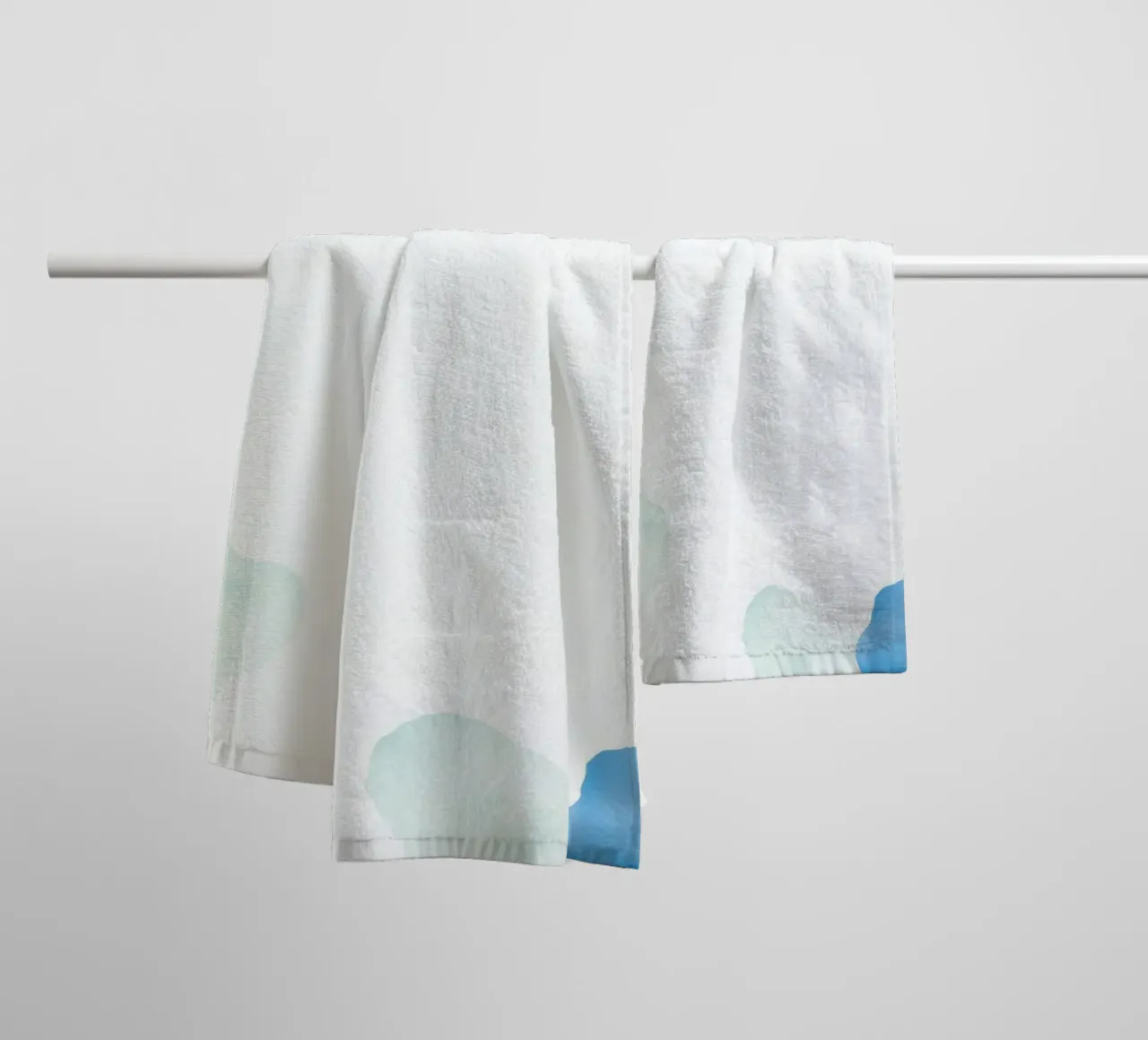 Watercolor abstract design featuring soft blues and greens towel by DesignDoodle