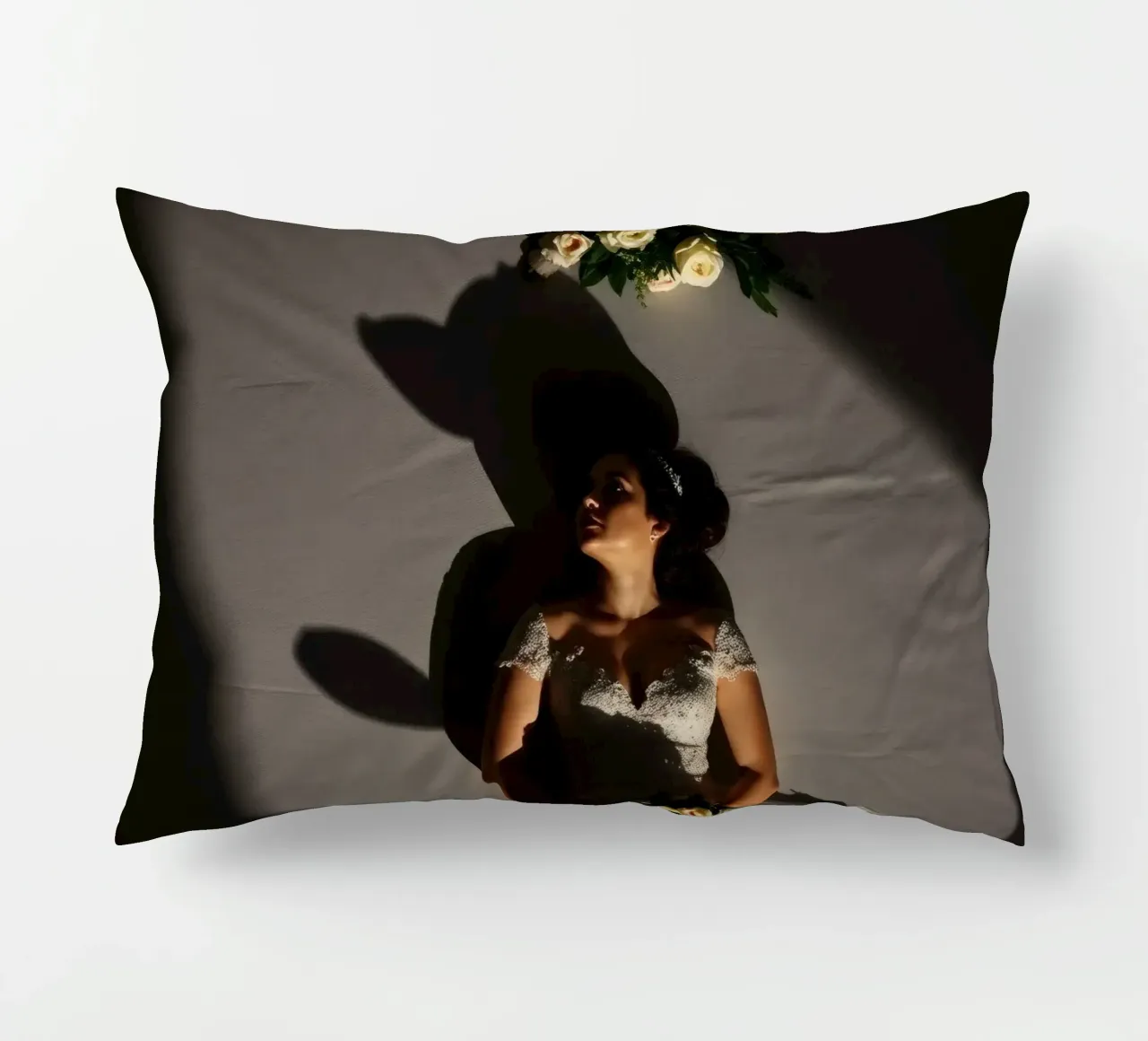 Bride in elegant gown poses dramatically under soft lighting decorative cushion by DesignDoodle