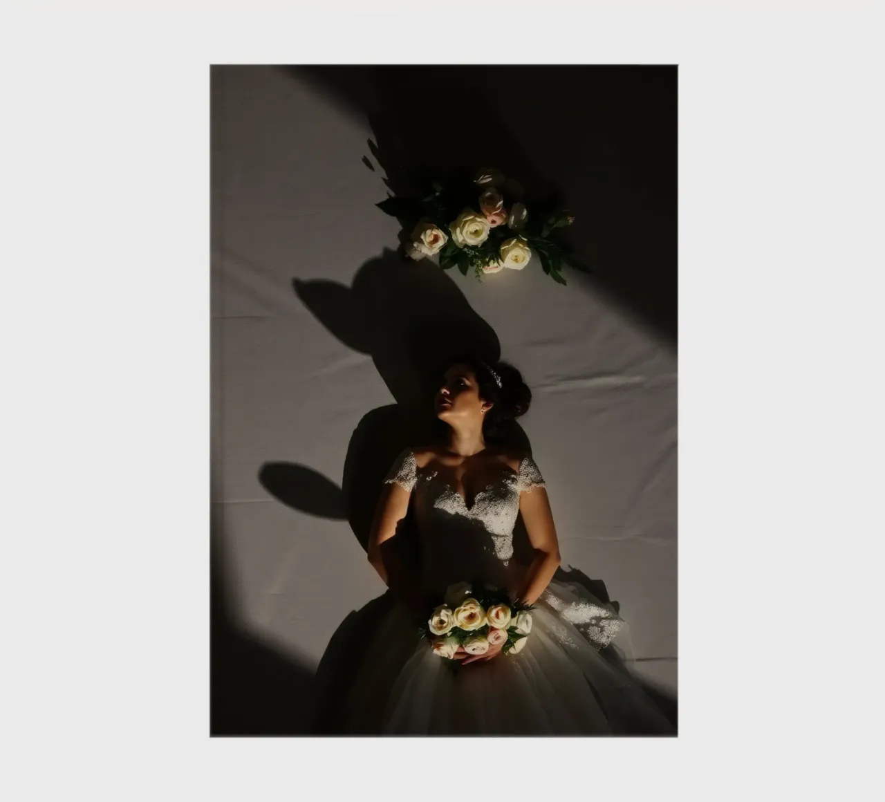 Bride in elegant gown poses dramatically under soft lighting notebook by DesignDoodle