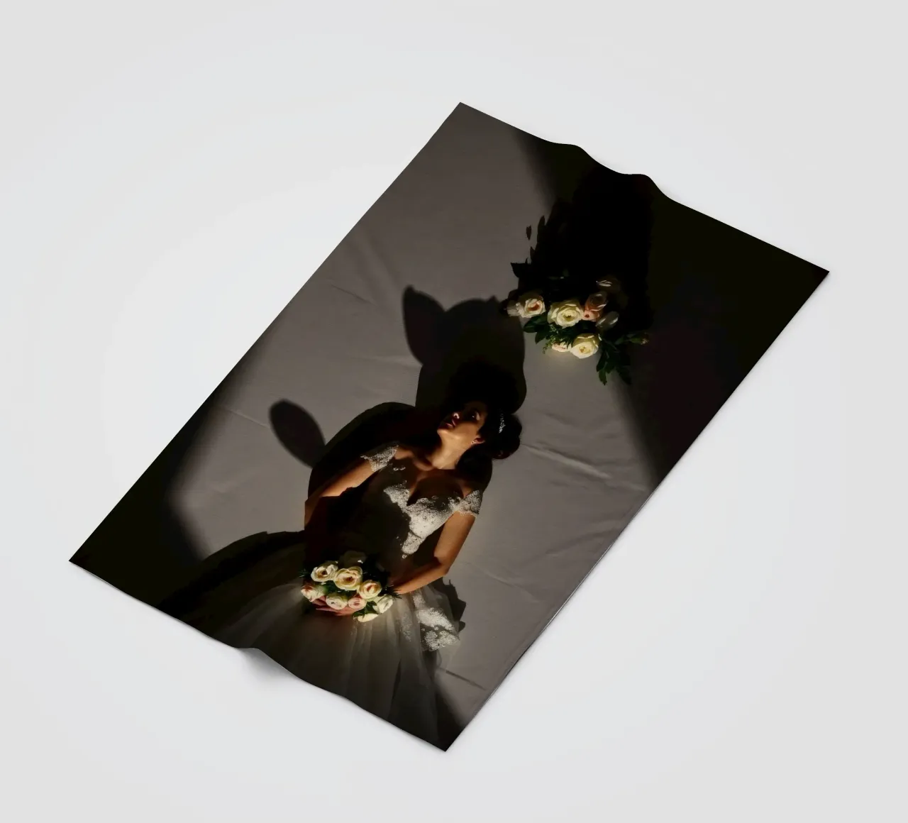 Bride in elegant gown poses dramatically under soft lighting fleece blanket by DesignDoodle