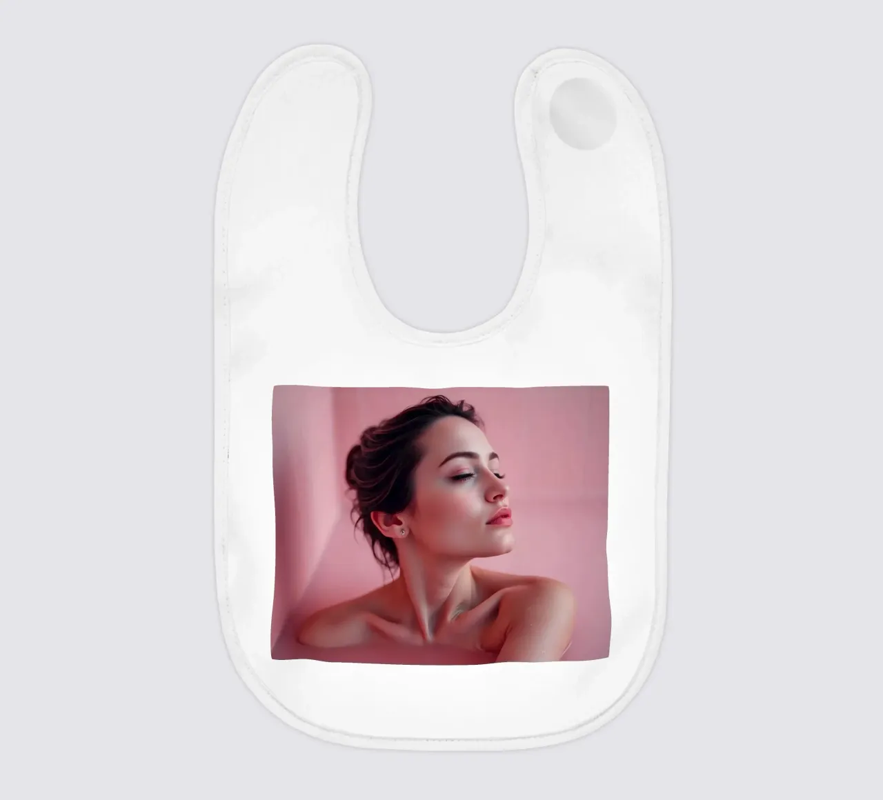 Relaxing bath experience in a serene pink setting baby bib by DesignDoodle