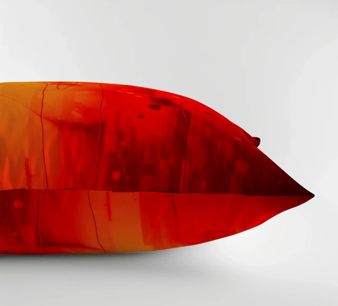 Bold abstract composition with vibrant red hues and dynamic decorative cushion by DesignDoodle