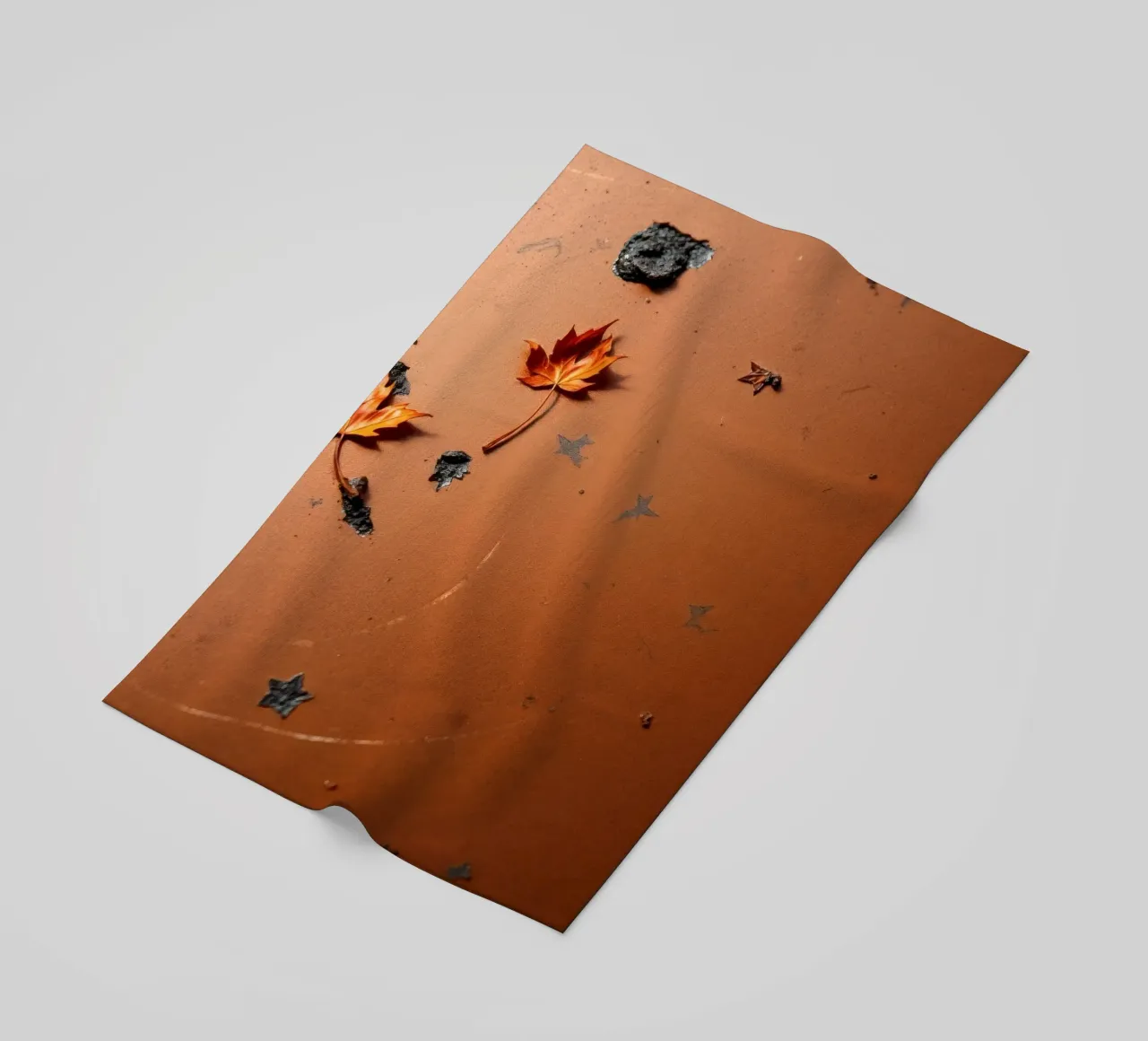 Feuilles d'automne colorées sur une surface rustique avec un motif étoilé serviette de plage de DesignDoodle