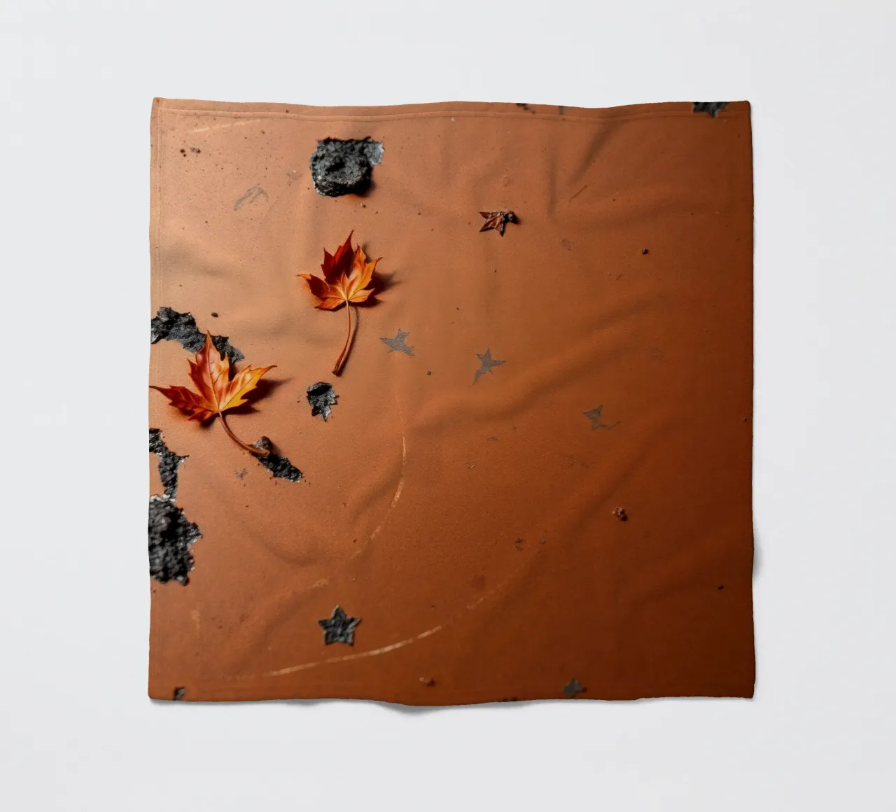 Feuilles d'automne colorées sur une surface rustique avec un motif étoilé plaid polaire de DesignDoodle