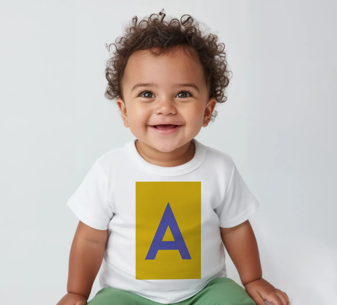 Yellow Letter A baby t-shirt by Studio One