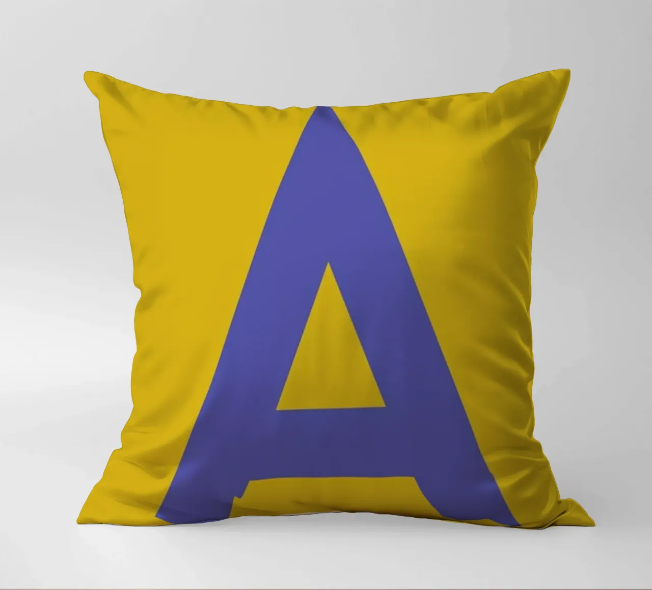 Yellow Letter A decorative cushion by Studio One