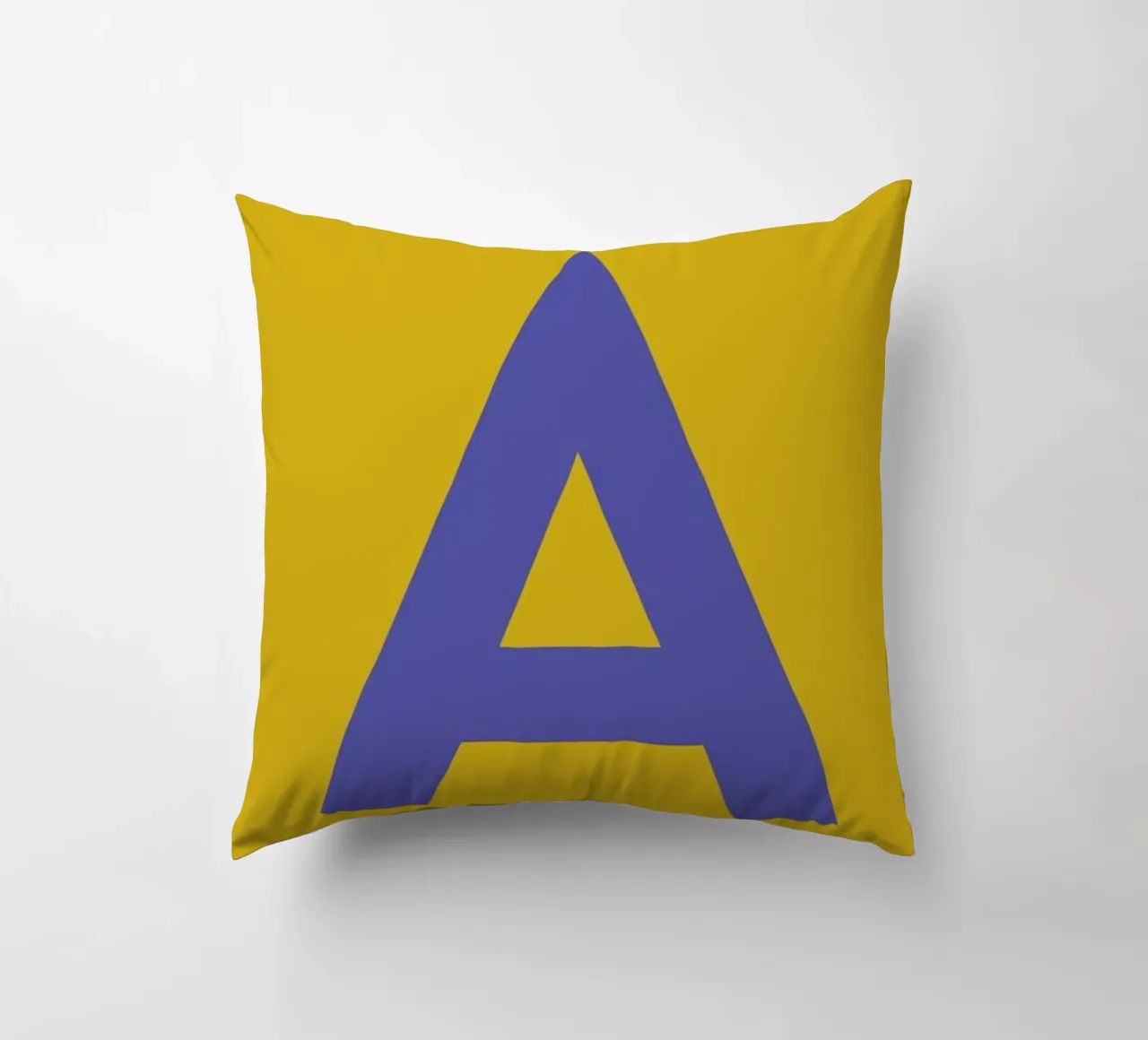 Yellow Letter A decorative cushion by Studio One