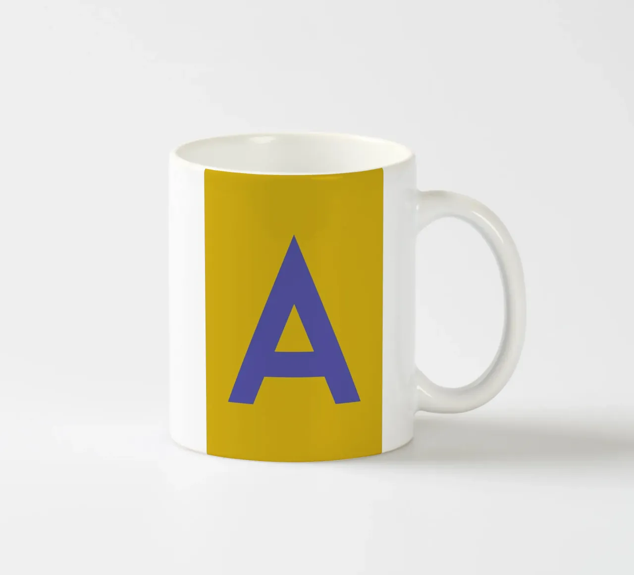 Yellow Letter A ceramic mug by Studio One