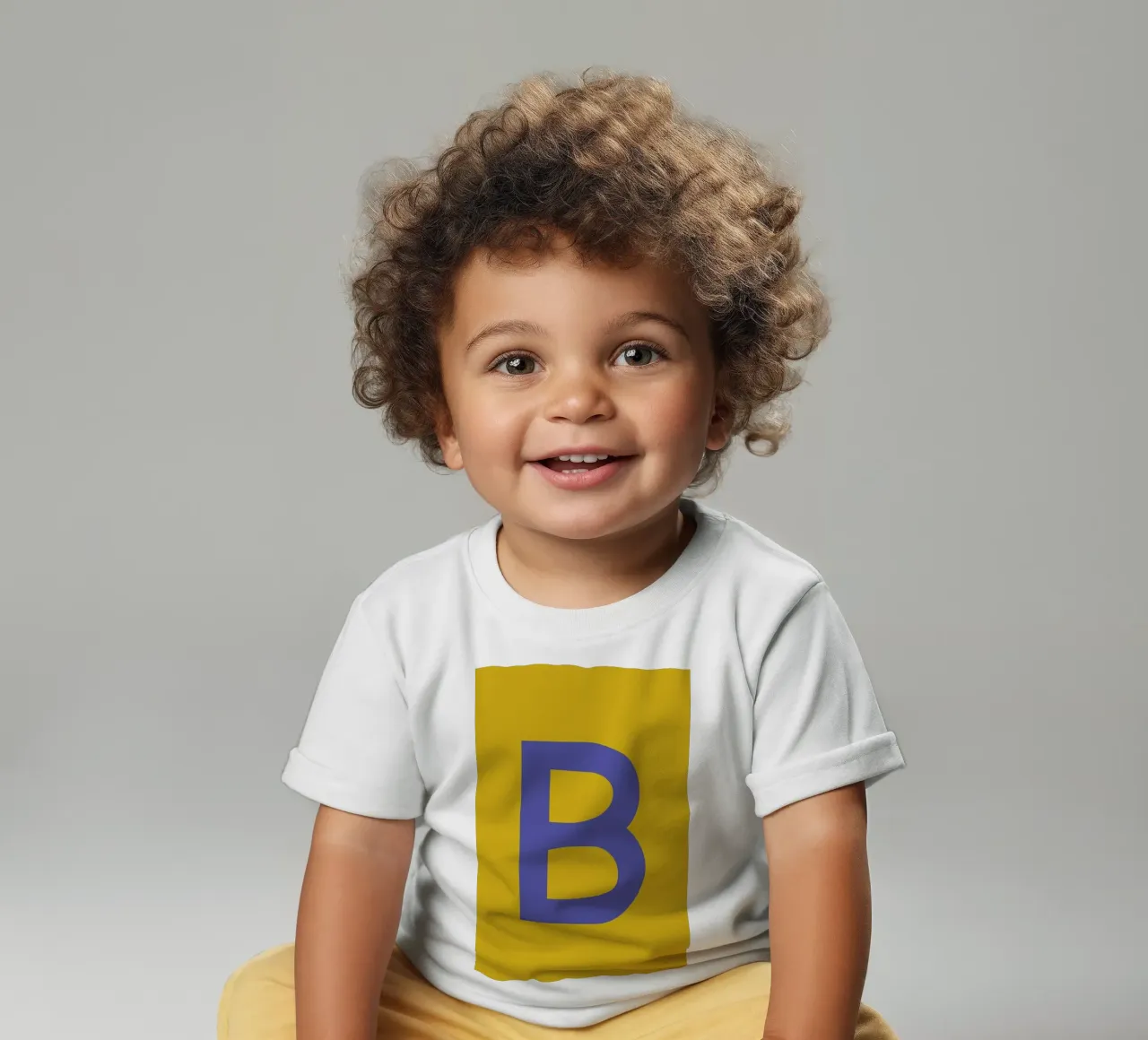 Yellow Letter B baby t-shirt by Studio One