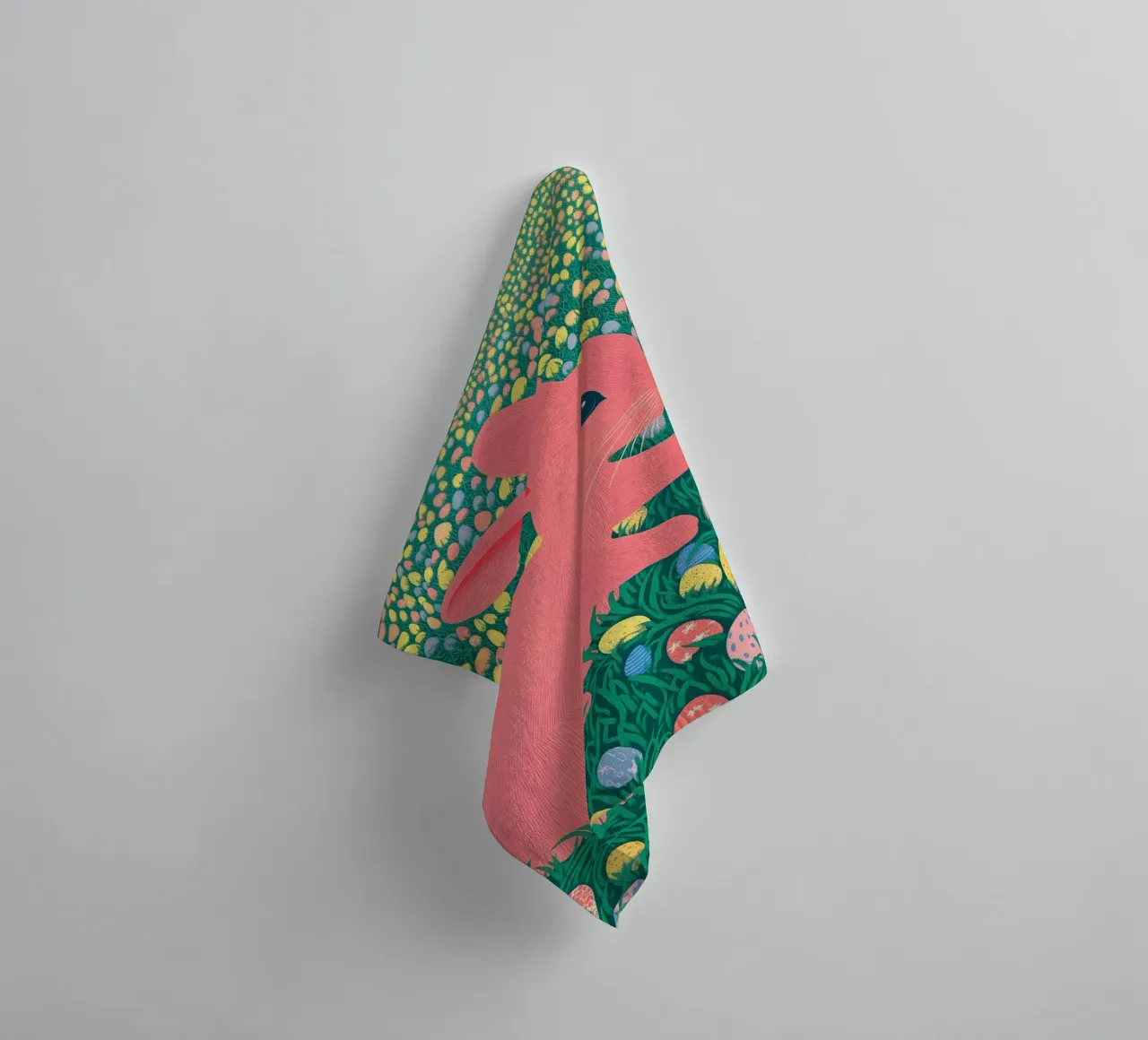 A Pink Rabbit in a Green Field full of Spring Easter Eggs towel by Kaji