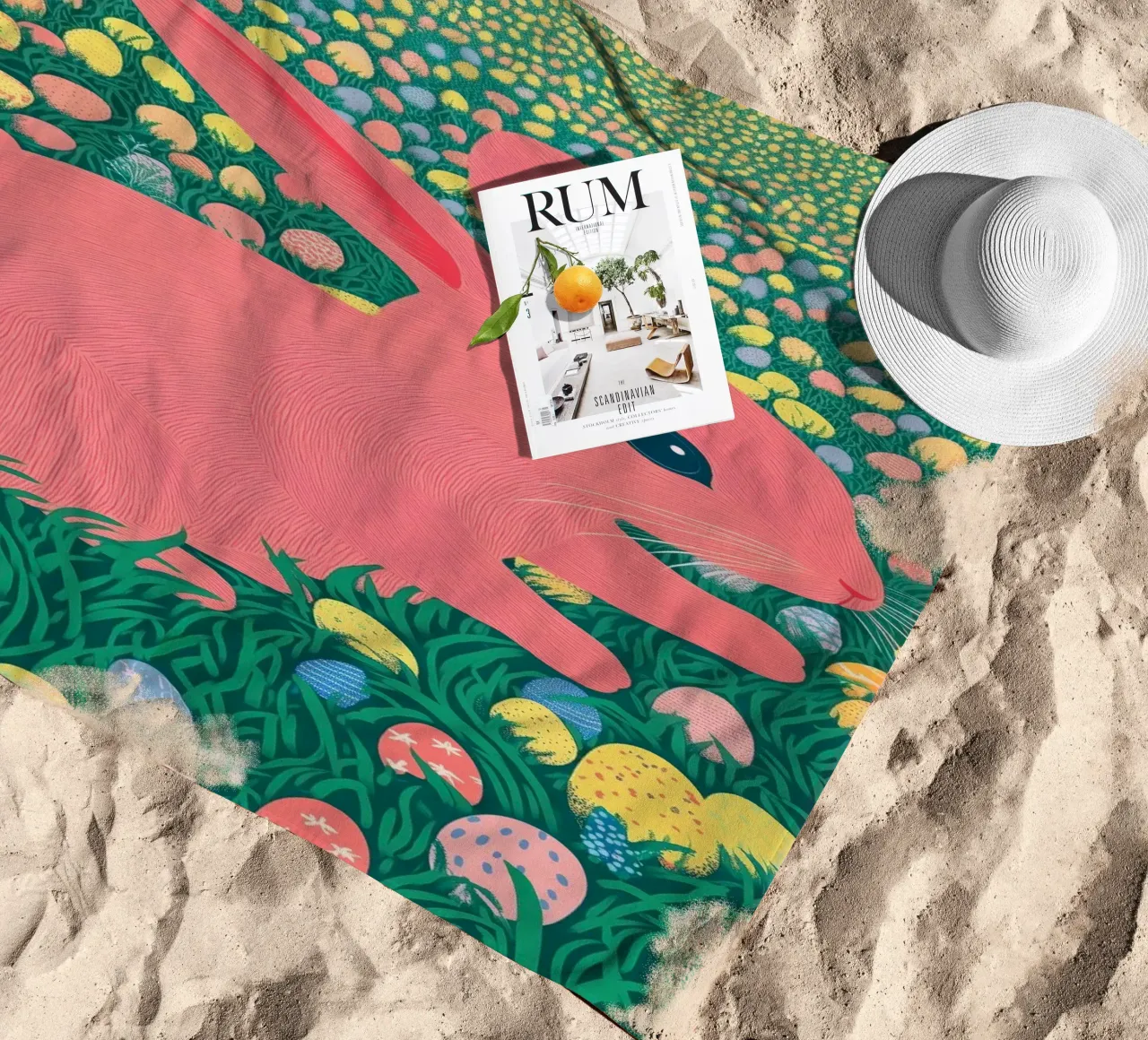 A Pink Rabbit in a Green Field full of Spring Easter Eggs beach towel by Kaji