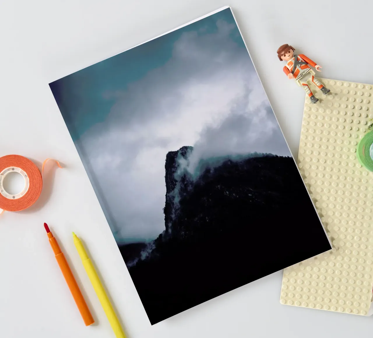 Grey notebook by Chris Abatzis