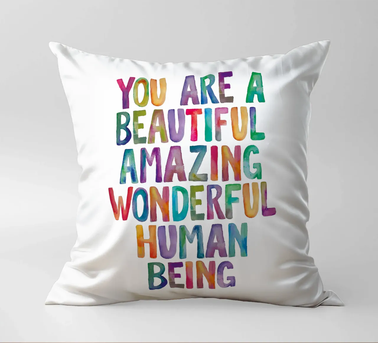 Sei un bellissimo, incredibile, meraviglioso essere umano cuscino da THE MOTIVATED TYPE