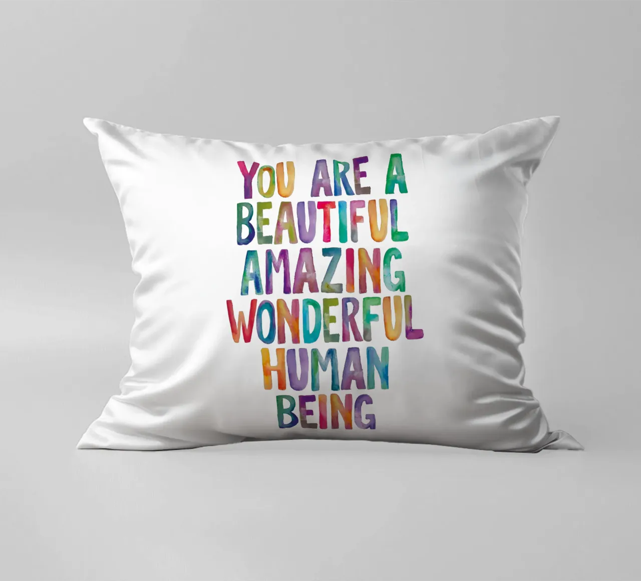 Sei un bellissimo, incredibile, meraviglioso essere umano cuscino da THE MOTIVATED TYPE