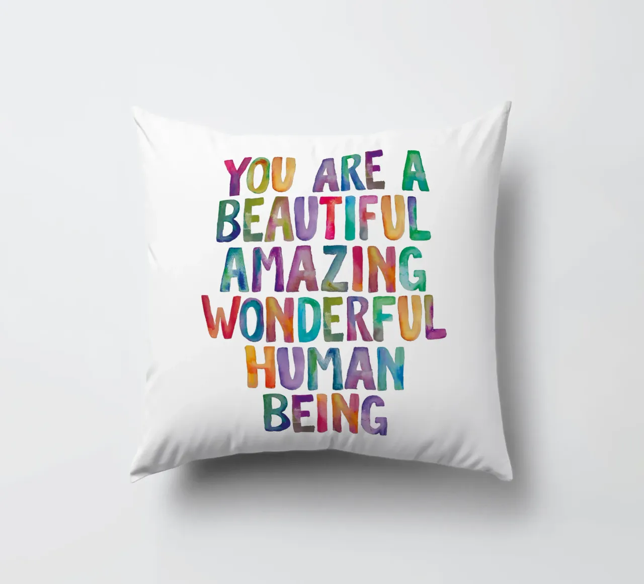 Sei un bellissimo, incredibile, meraviglioso essere umano cuscino da THE MOTIVATED TYPE
