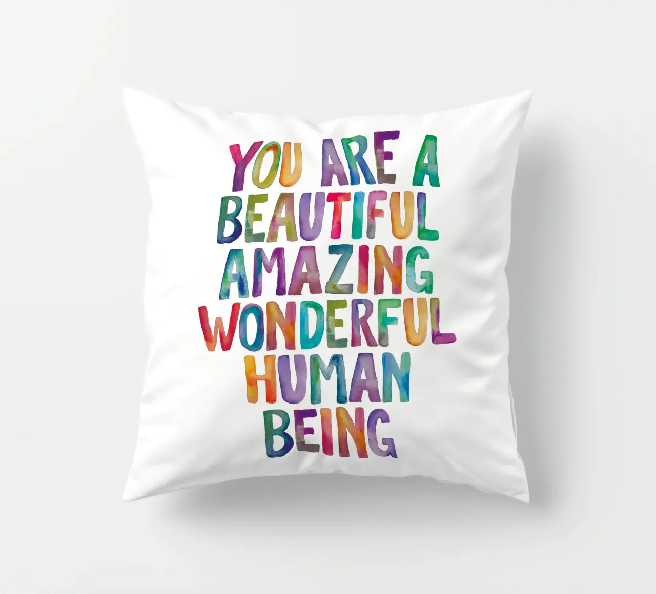 Sei un bellissimo, incredibile, meraviglioso essere umano cuscino da THE MOTIVATED TYPE