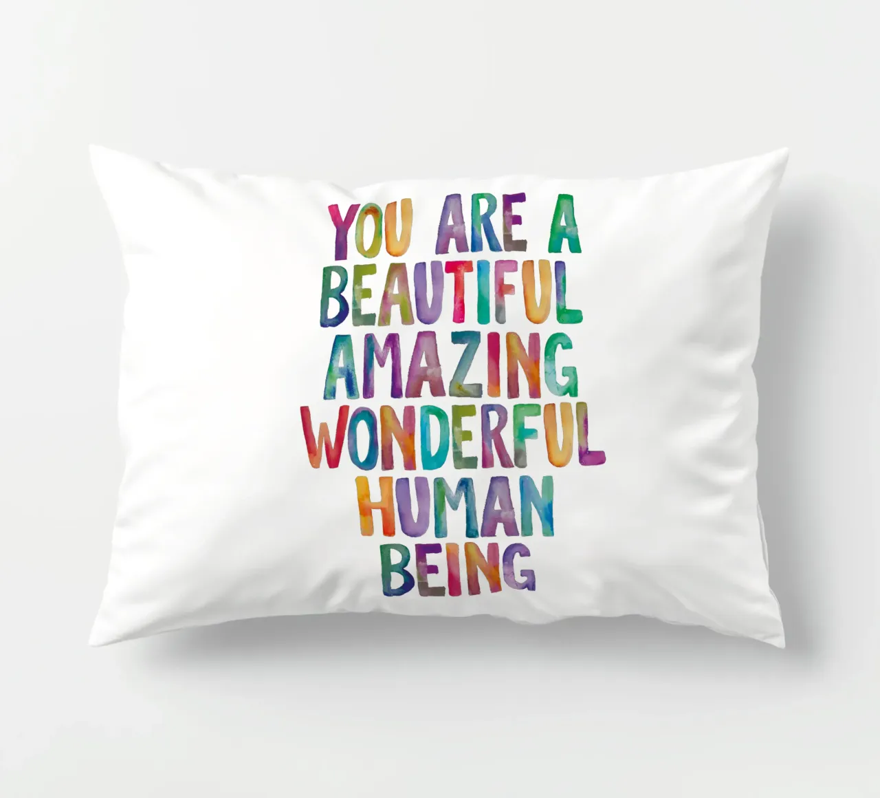 Sei un bellissimo, incredibile, meraviglioso essere umano cuscino da THE MOTIVATED TYPE