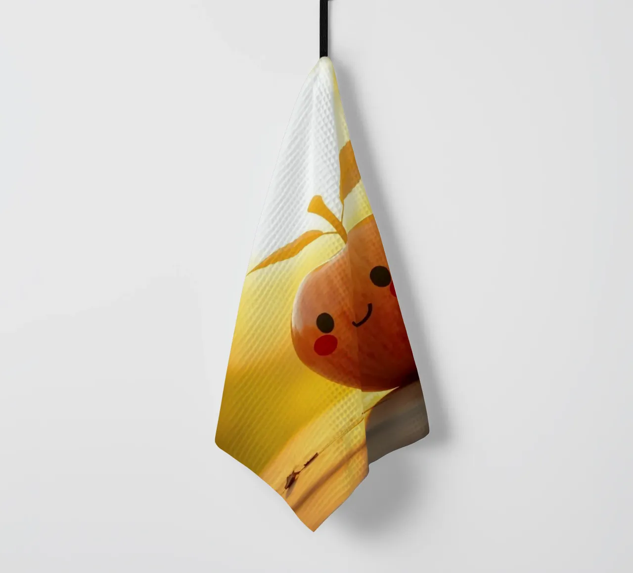 Happy apple with a smile and leaves enjoys a sunset tea towel by DesignDoodle