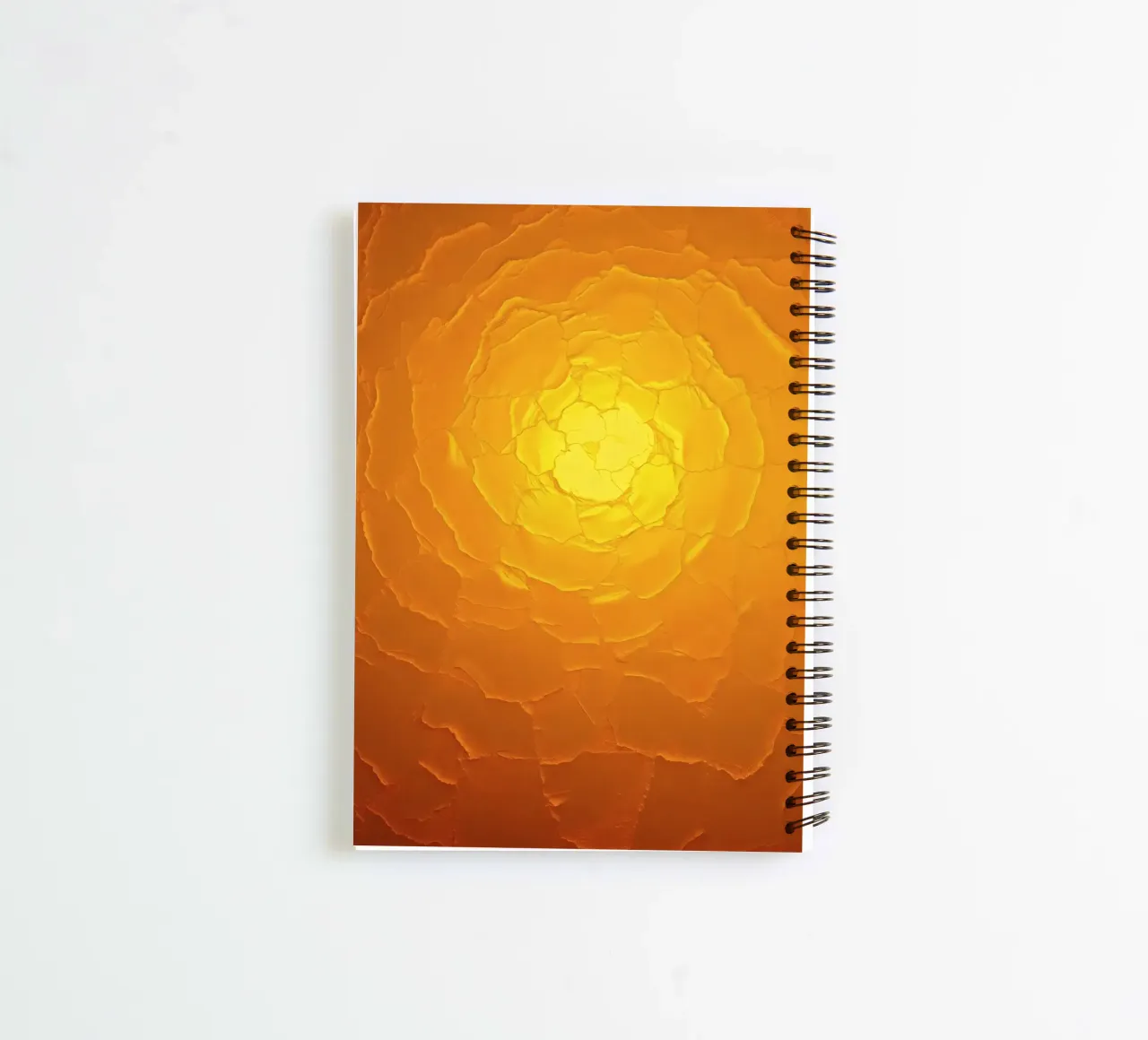 Abstract pattern resembling a warm sun with layered textures spiral notebook by DesignDoodle
