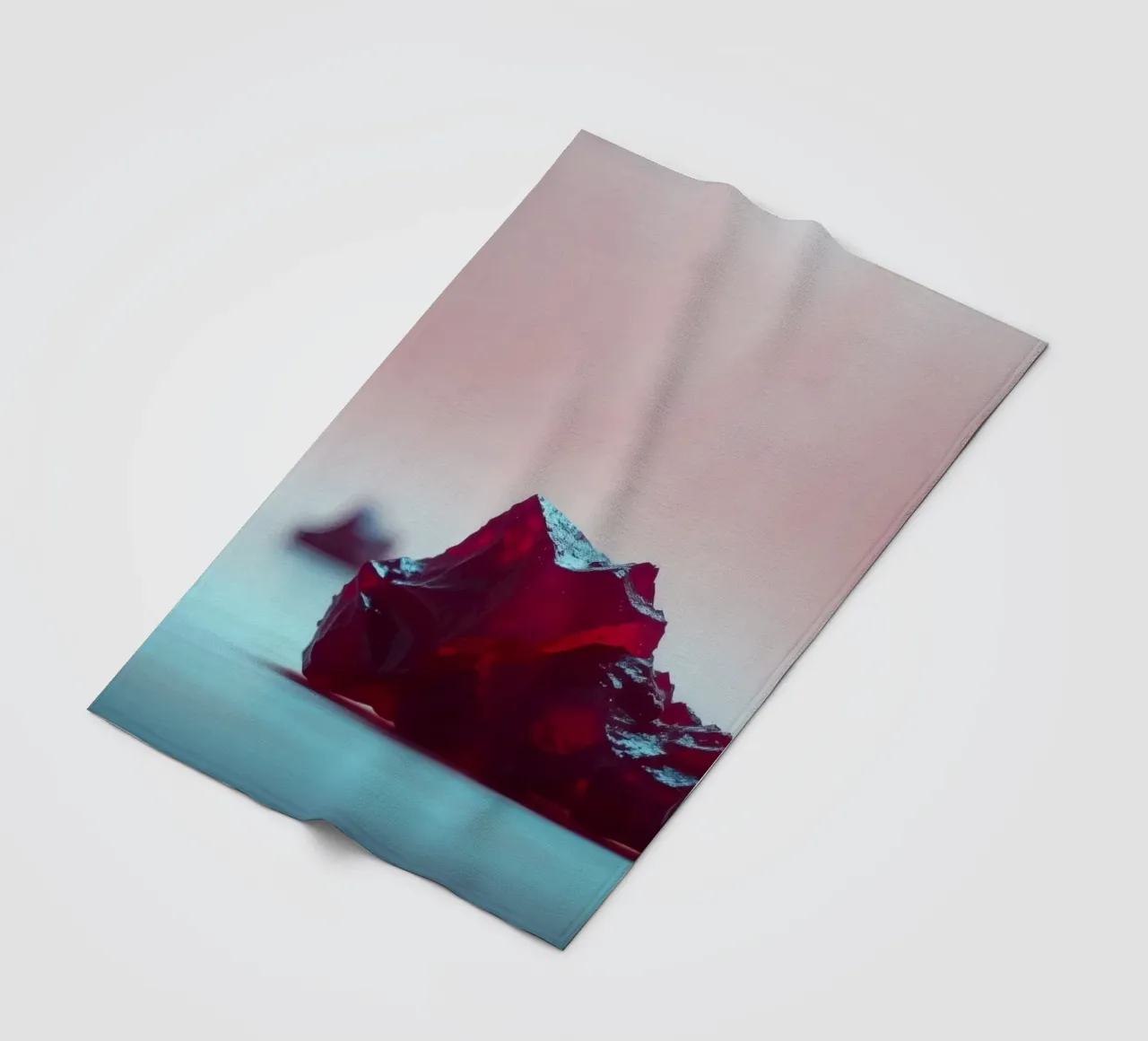 Bright red gelatin cubes scattered on a soft surface fleece blanket by DesignDoodle