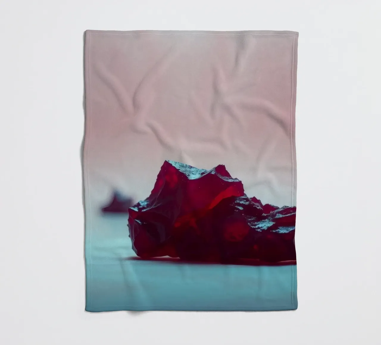 Bright red gelatin cubes scattered on a soft surface fleece blanket by DesignDoodle