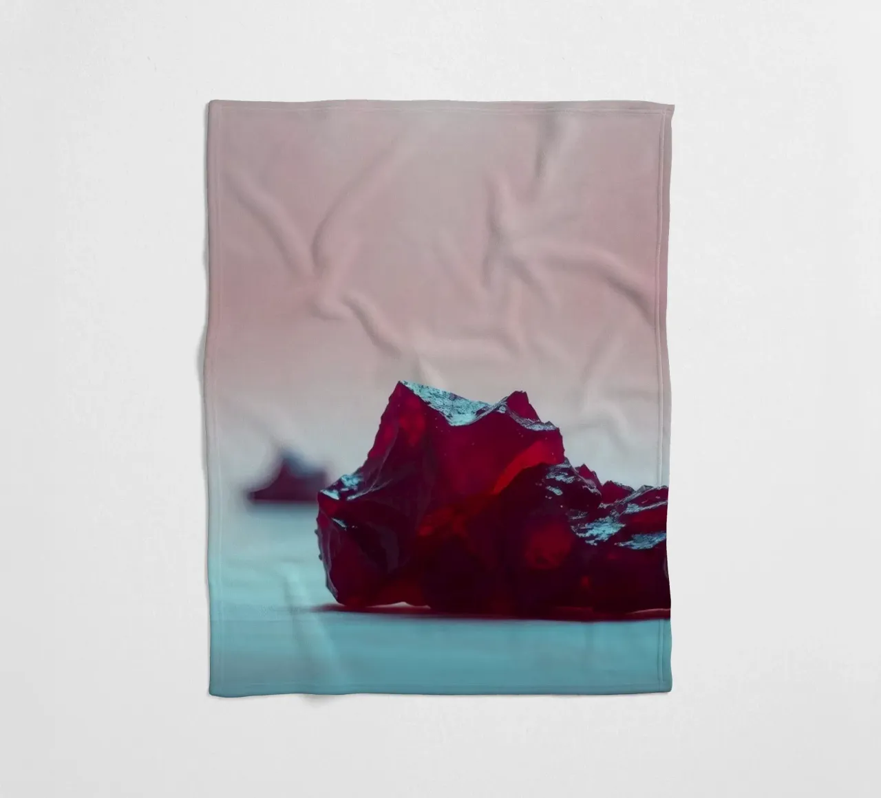 Bright red gelatin cubes scattered on a soft surface fleece blanket by DesignDoodle