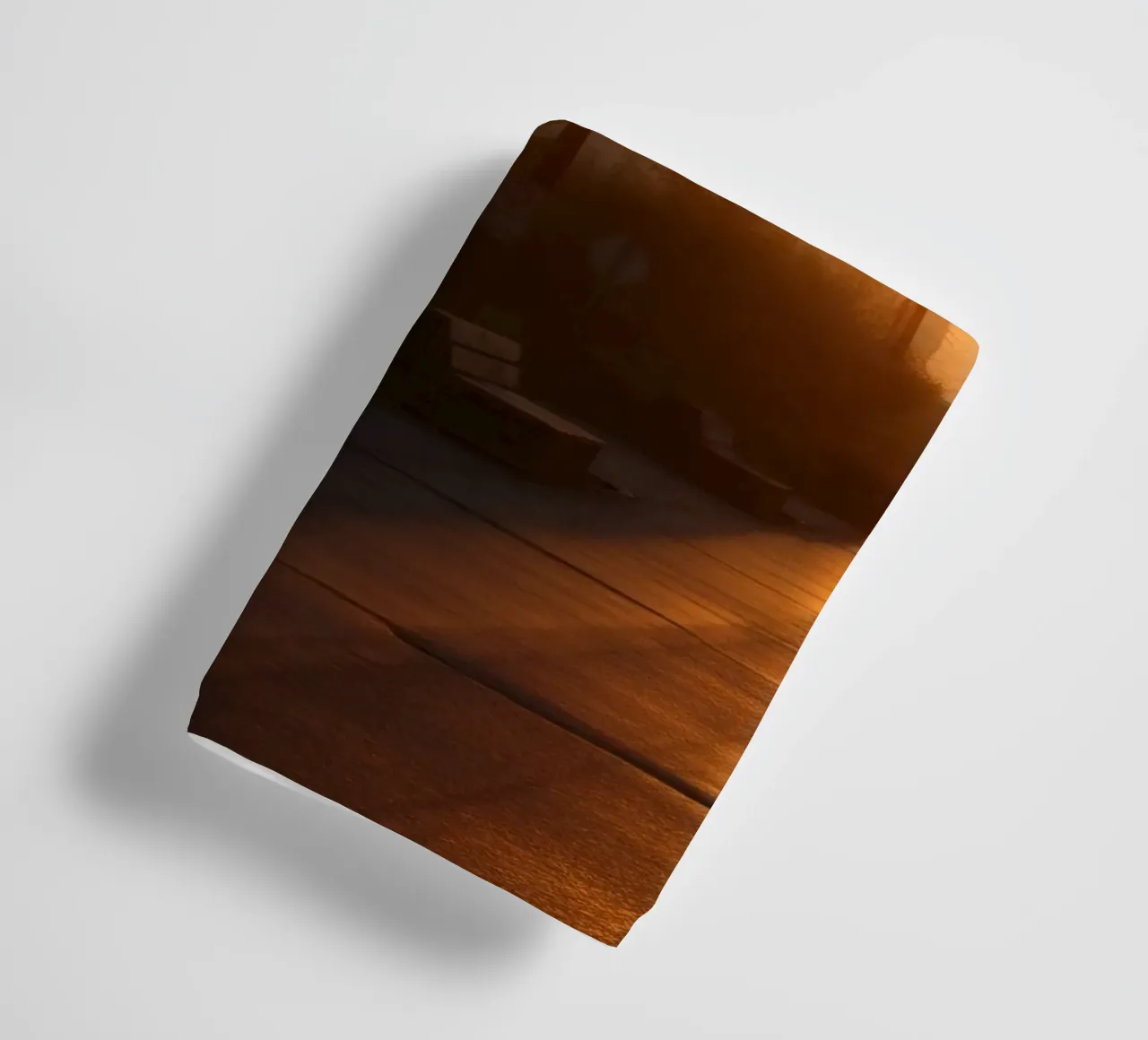 Sunset casts a golden glow over a quiet street lined towel by DesignDoodle