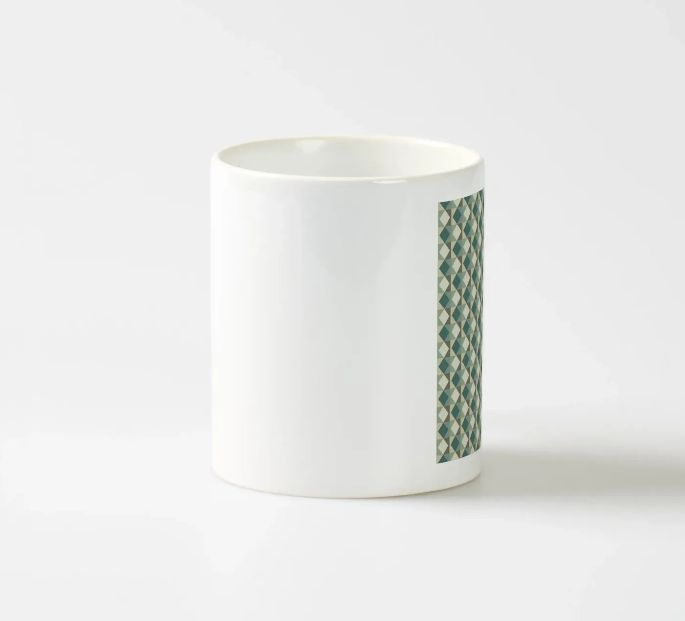 Green geometric pyramid pattern ceramic mug by Little Dean