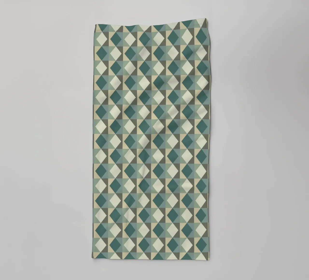 Motif géométrique vert en forme de pyramide serviette de bain de Little Dean