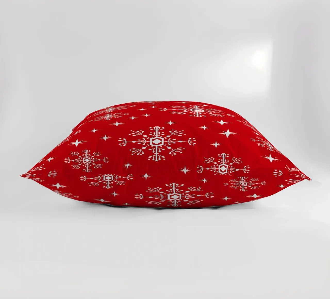 Snowflake decorative cushion by Charlotte Winter