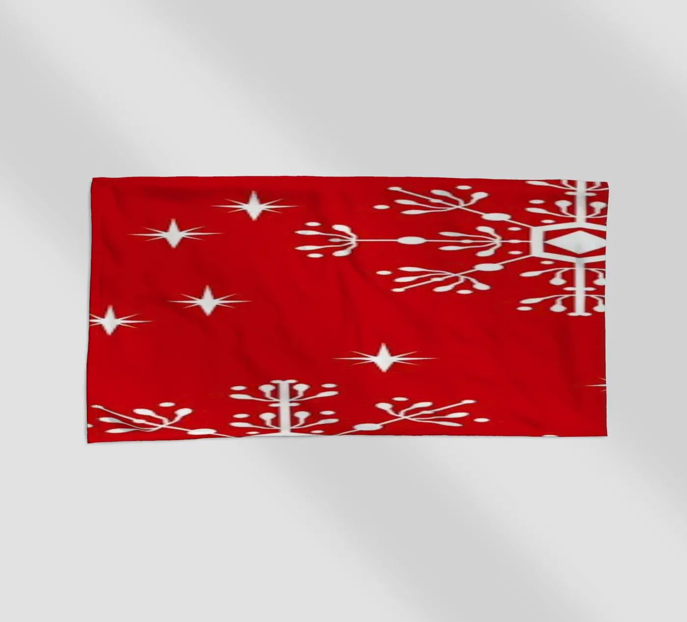 Snowflake beach towel by Charlotte Winter