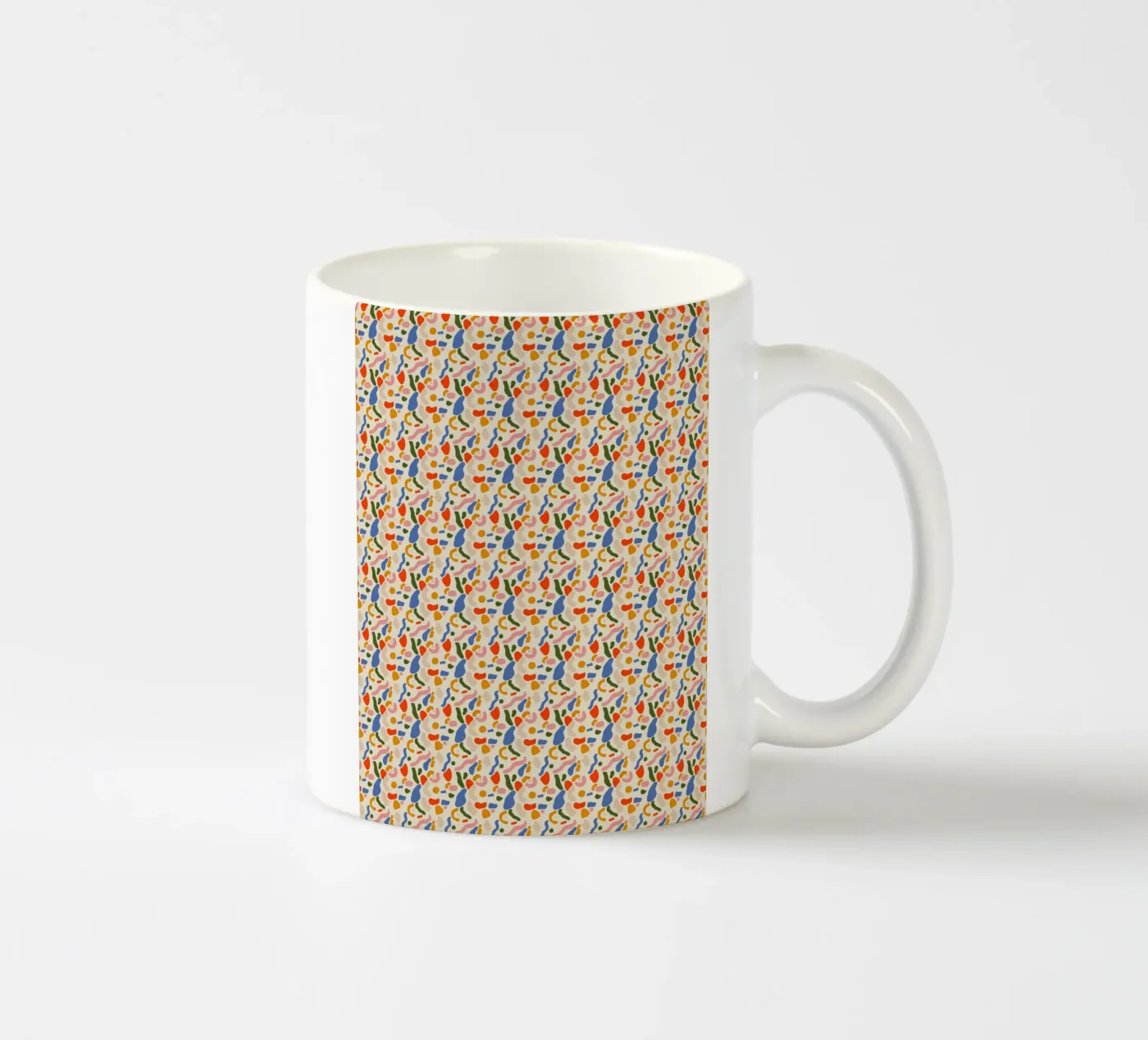 Confetti seamless pattern ceramic mug by Little Dean
