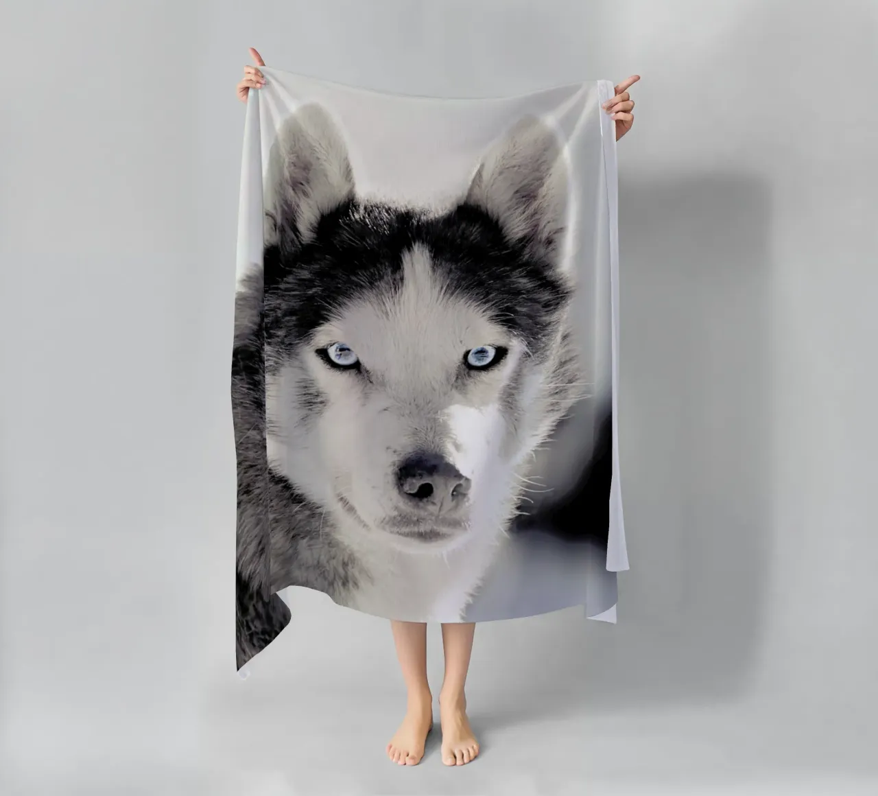 Husky beach towel by Monika Strigel