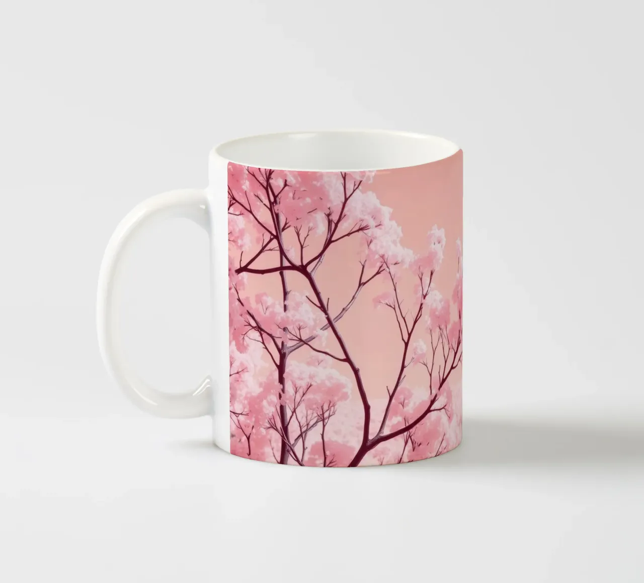 Alberi rosa in fiore sotto un cielo pastello tazza in ceramica da DesignDoodle