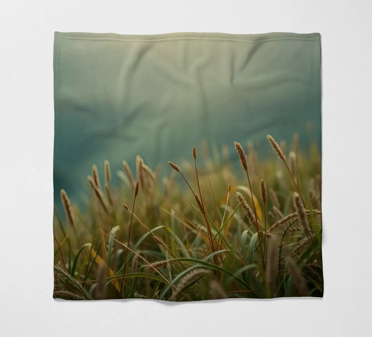 Golden grass sways gently in the breeze on a hillside fleece blanket by DesignDoodle