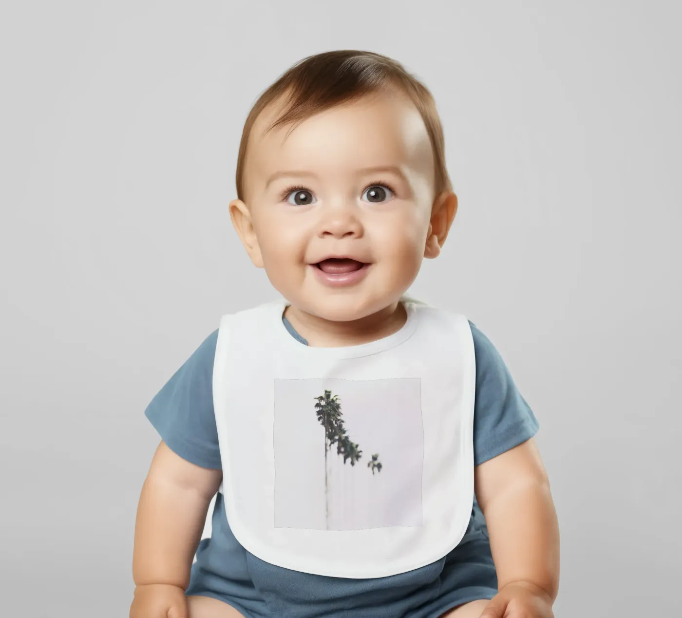 Palms baby slabbetje van Ingrid Beddoes