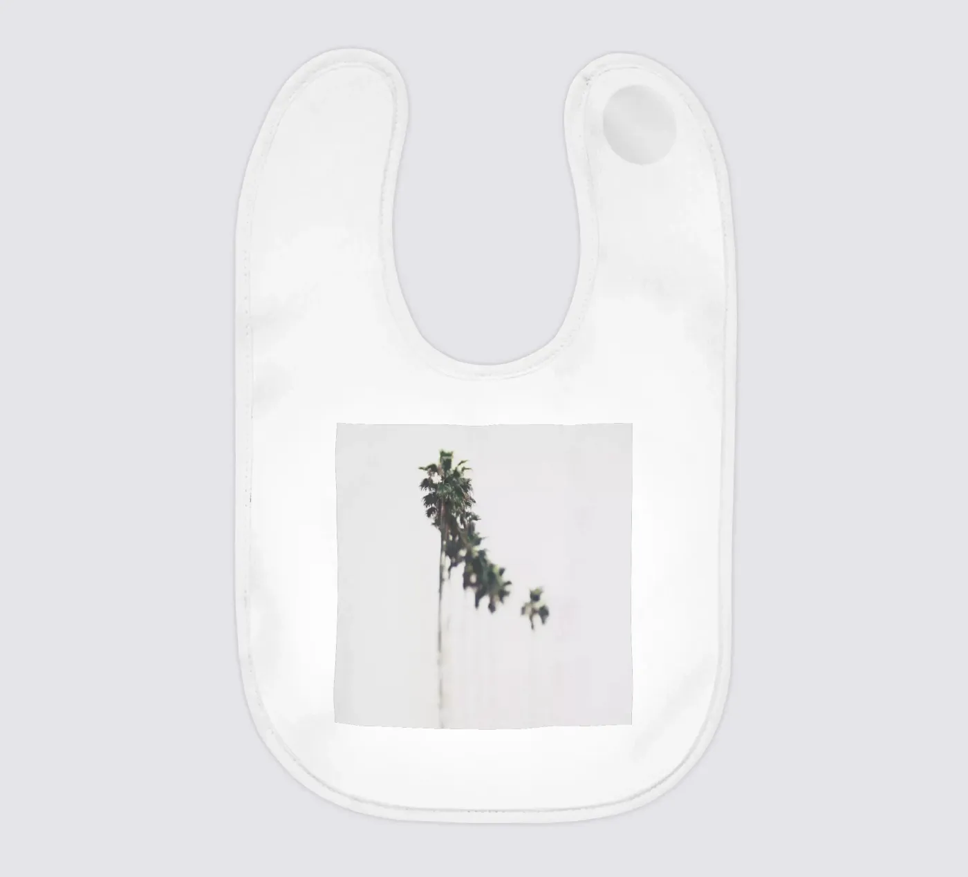 Palms bavoir de Ingrid Beddoes