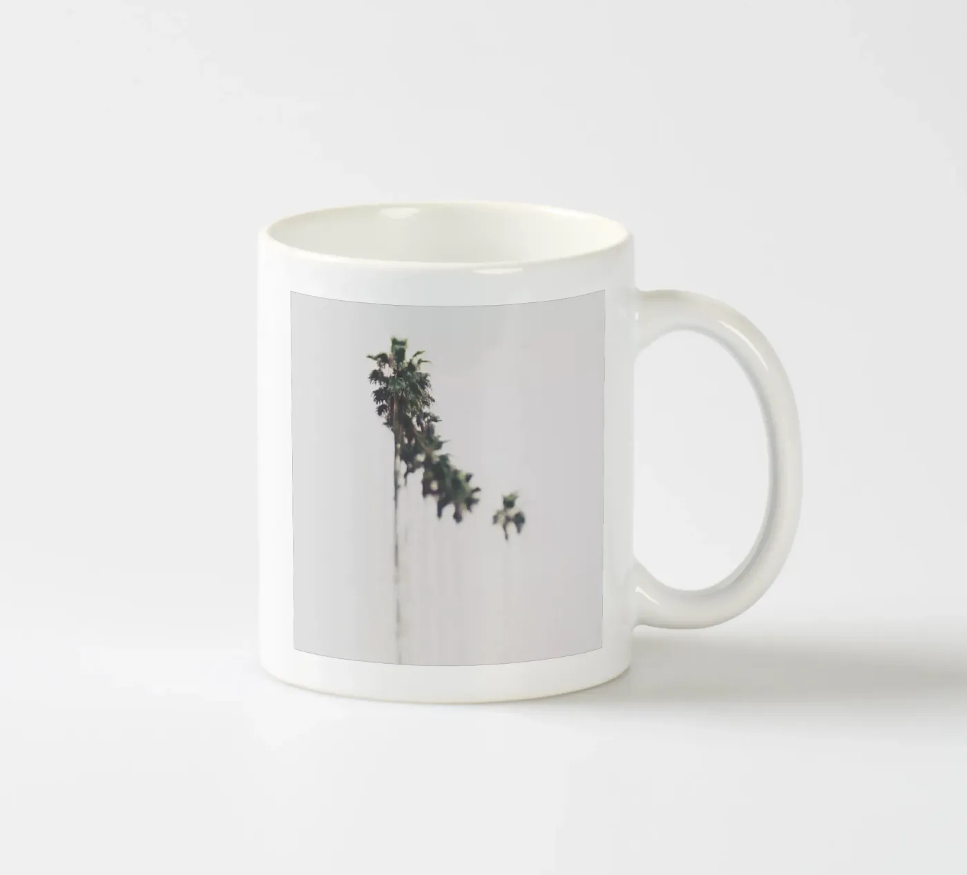 Palms ceramic mug by Ingrid Beddoes