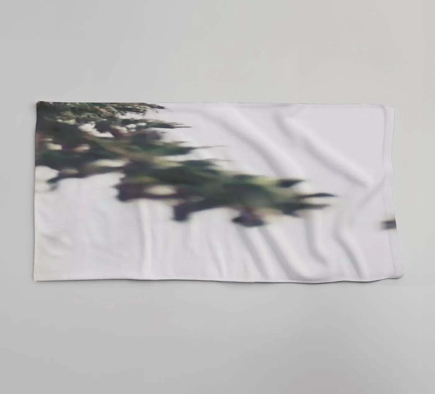 Palms towel by Ingrid Beddoes