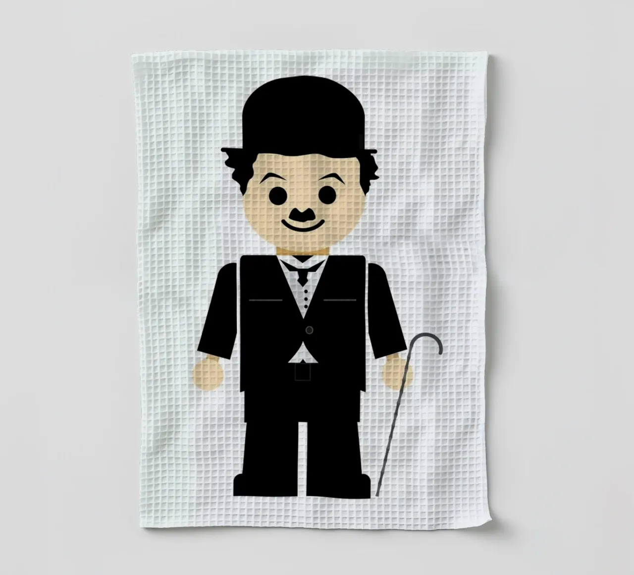 Chaplin Toy tea towel by Rafa Gomes