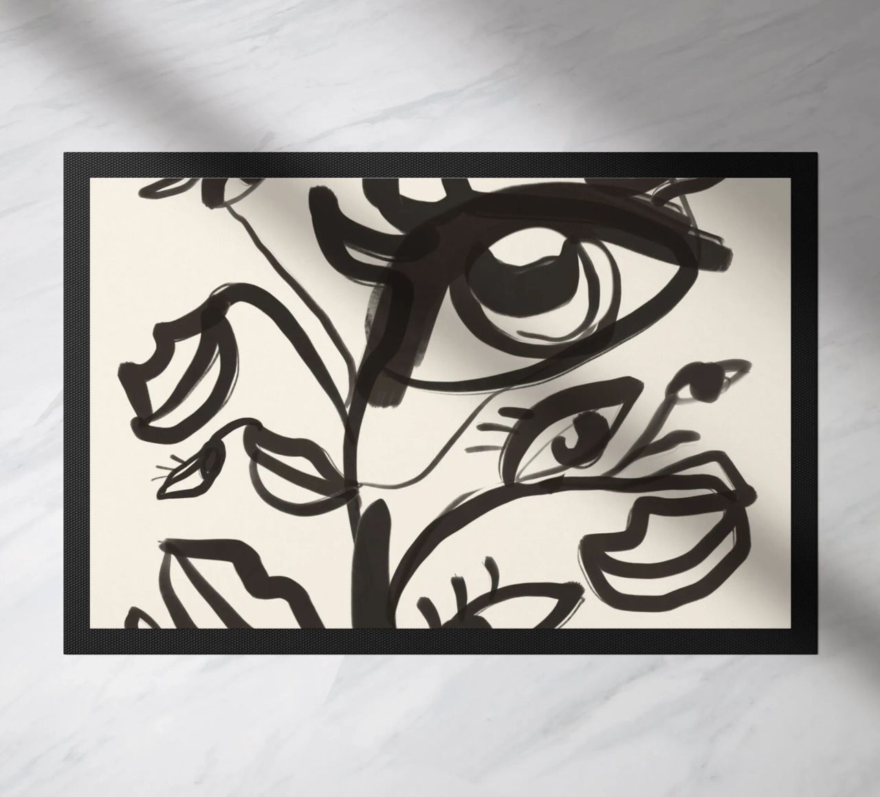 Yeux abstraits en dessin au trait paillasson de ThingDesign