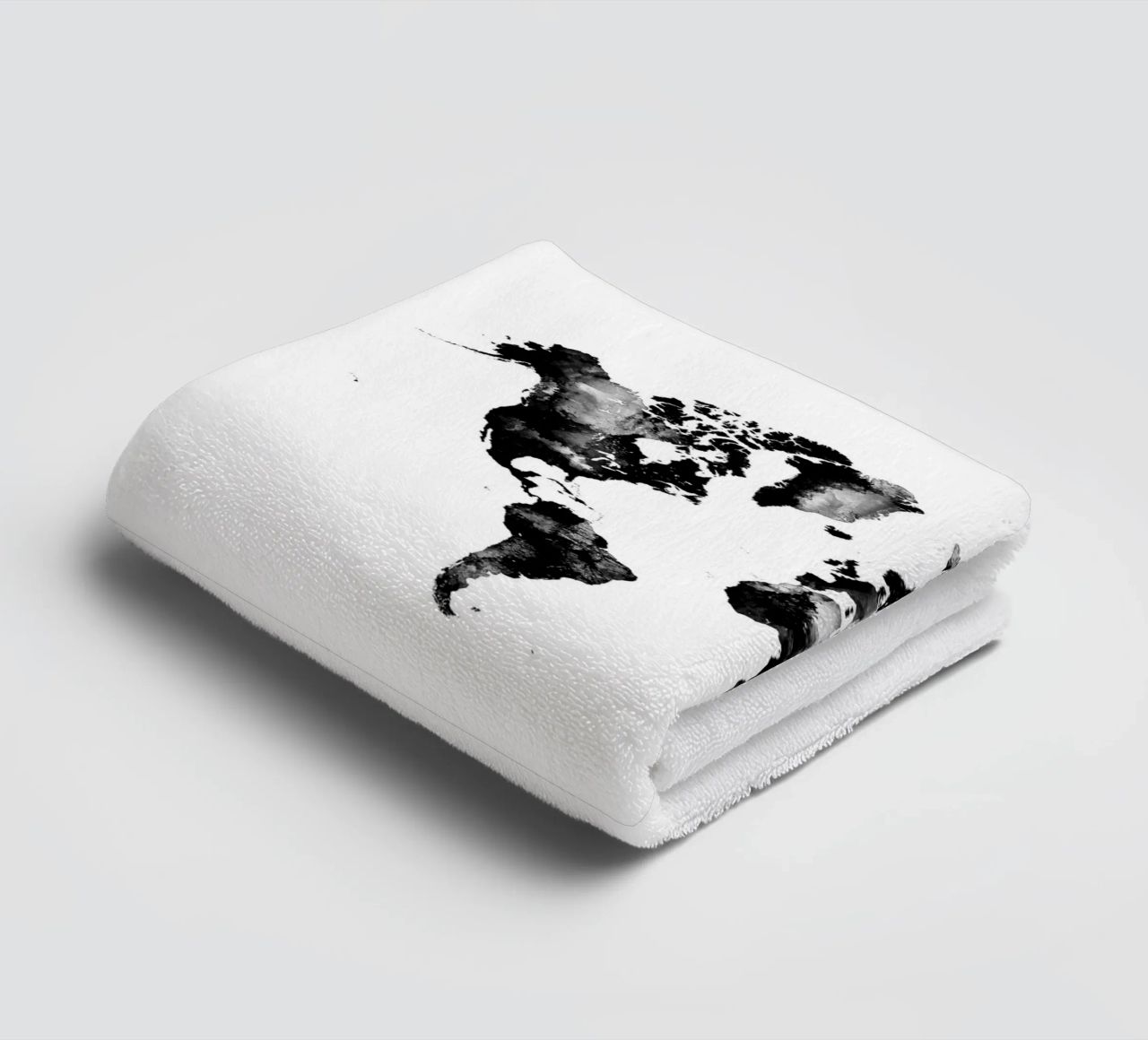 Black and white world map towel by Justyna Jaszke JBJart