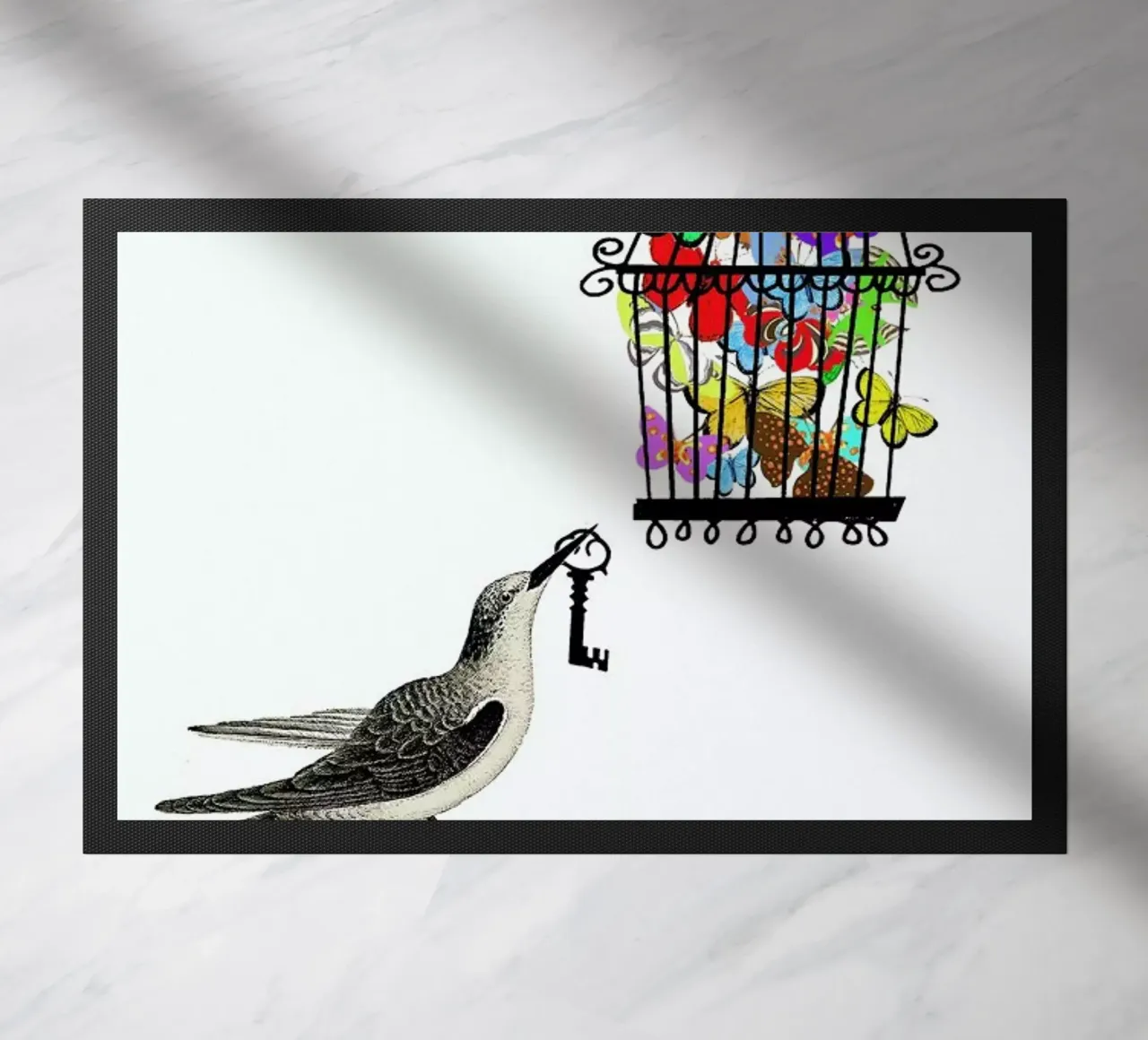 The bird has the key felpudo de Rococco LA
