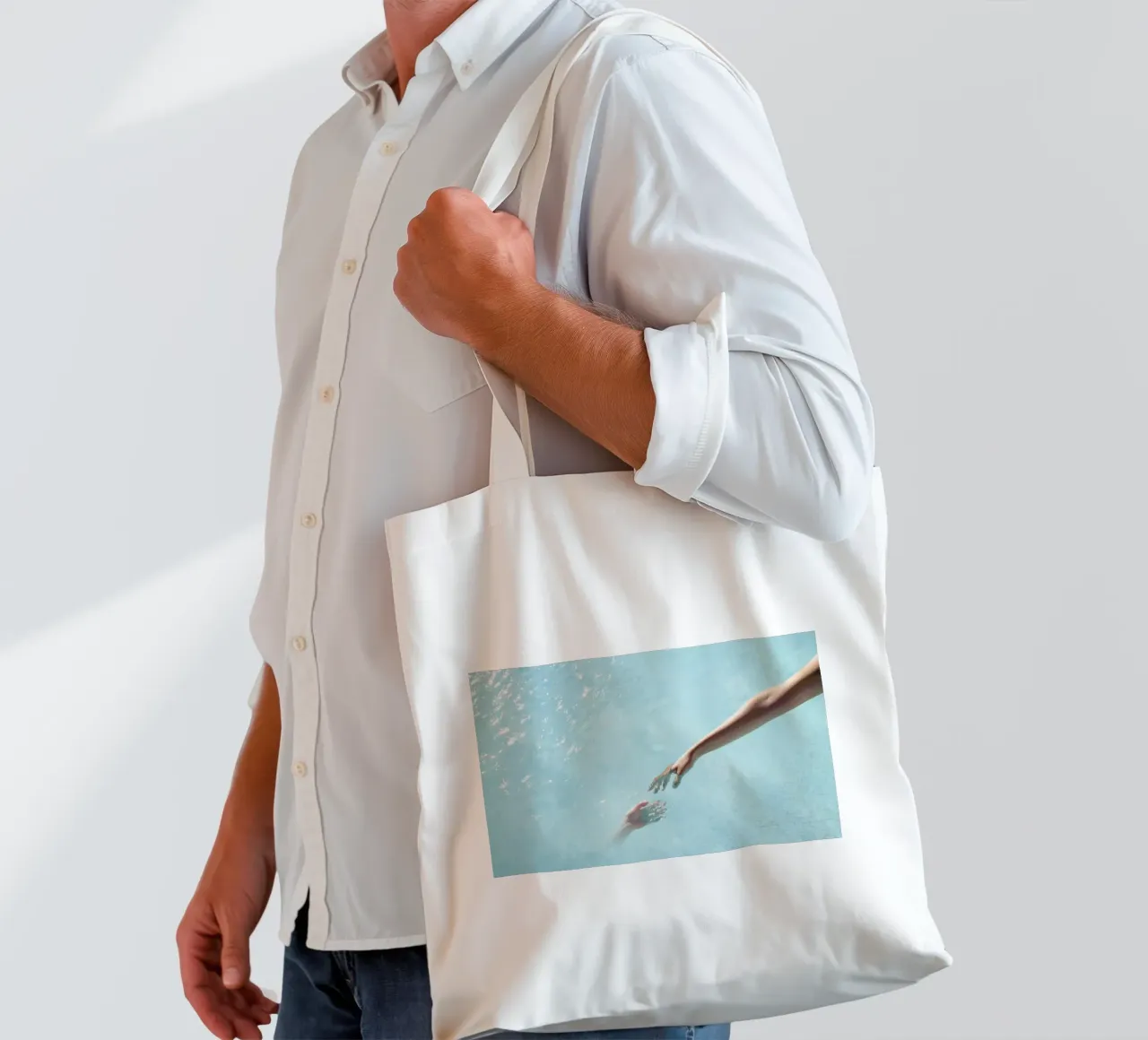 Water Sparkle - Surreal Hands Touch tote bag by Ingrid Beddoes
