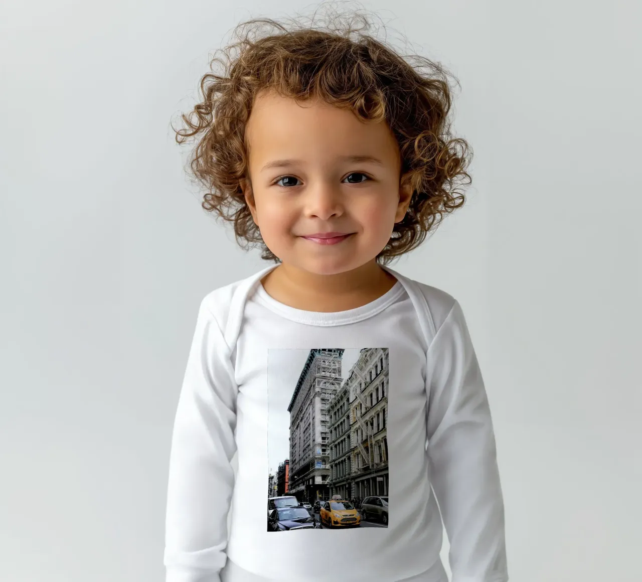 New York long-sleeve baby romper by NET Talents GmbH