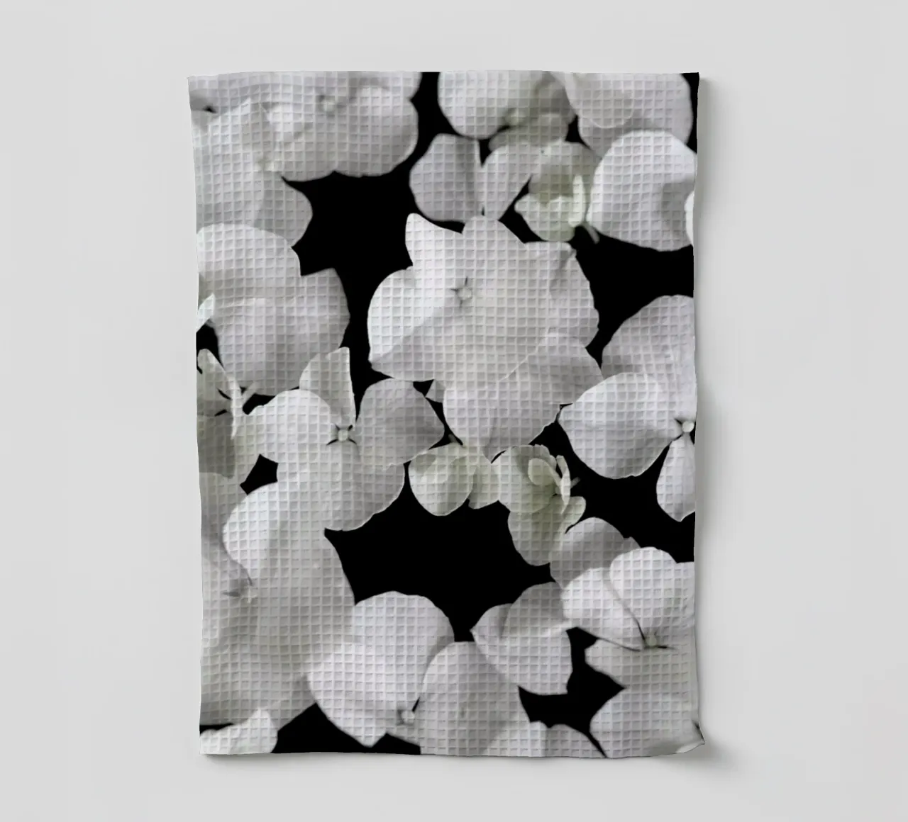 White Beauty On Black tea towel by Studio Nahili