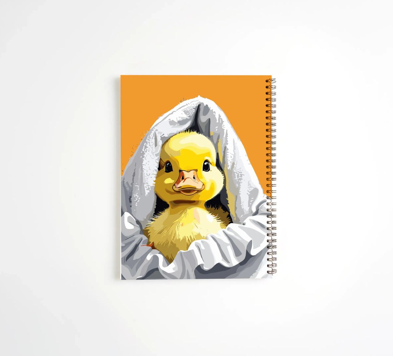 Duckling peeking from under a soft carnet à spirale de LisaArtes