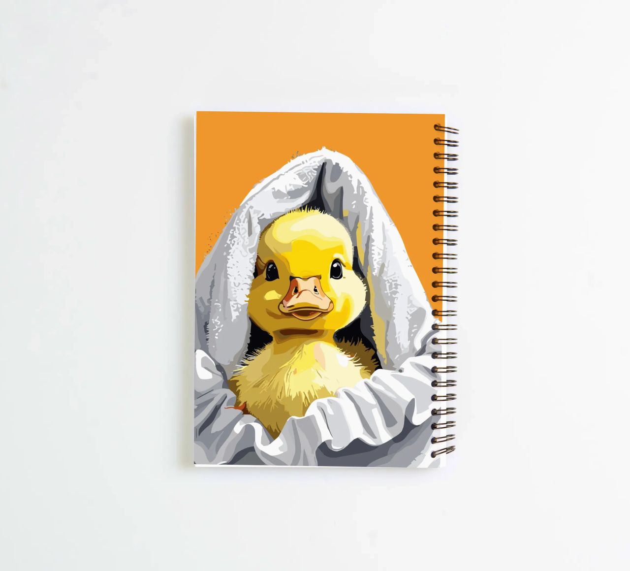 Duckling peeking from under a soft carnet à spirale de LisaArtes